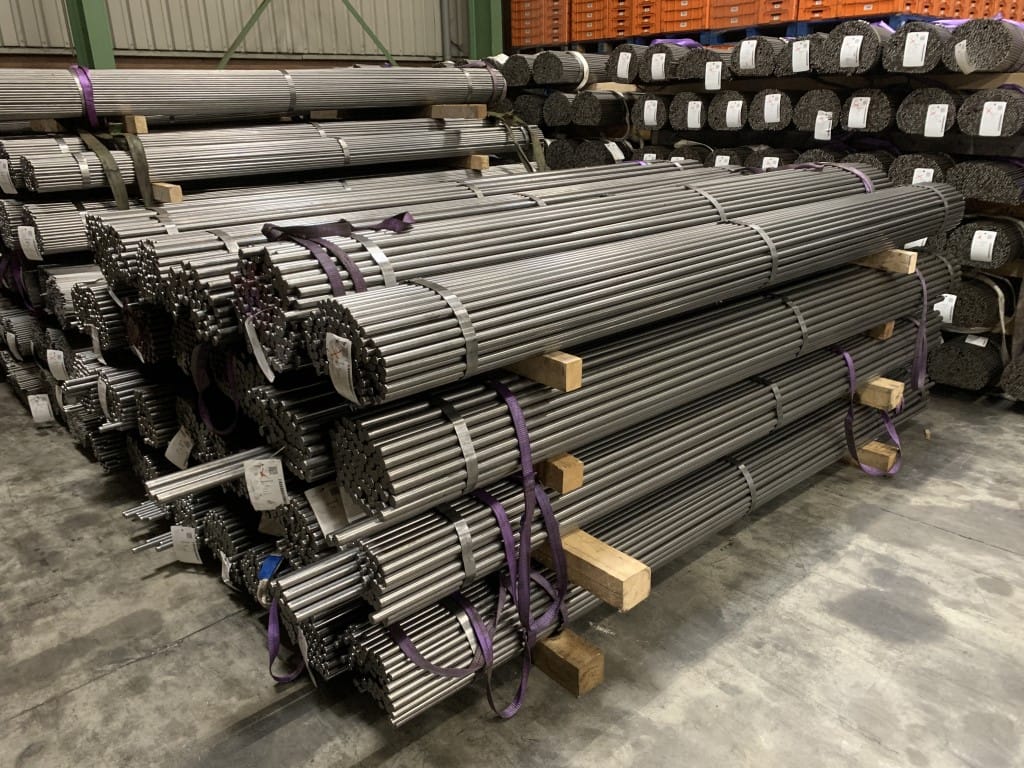 Bright steel bars stacked in bundles